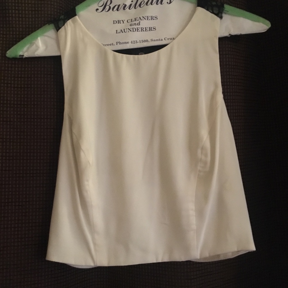 Beautiful ivory and black lace midriff top.